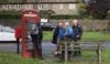 Ralph seeks instructions on how to use a public phone box