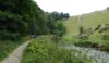 The riverside path is preferable to climbing these hills