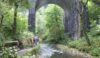 Riverside path goes under a bridge