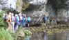 Simon leads the group over the stepping stones