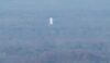 Tall white building in Chelford?
