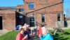 Drinks and gossip in the sunny beer garden